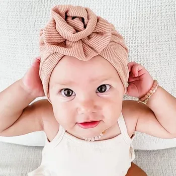 תינוקת יפיפיה Bowknot טורבן קשר ראש עוטפת את התינוק ילדים מוצק צבע המצנפת ביני היילוד צילום אביזרים כובע אביב קיץ